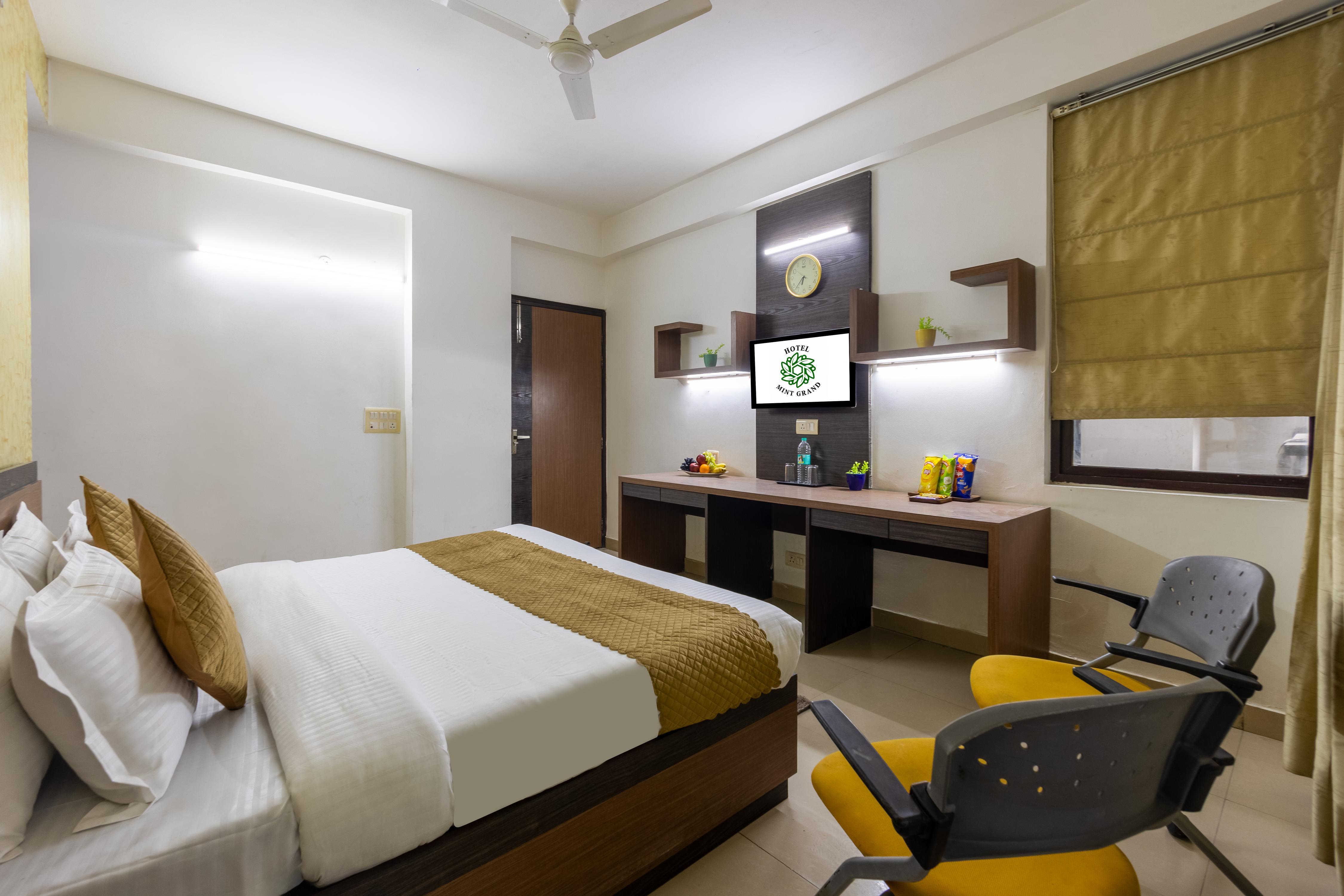 Hotel Mint Grand - A Smart Stay Near Yashobhoomi - Tap to explore photos