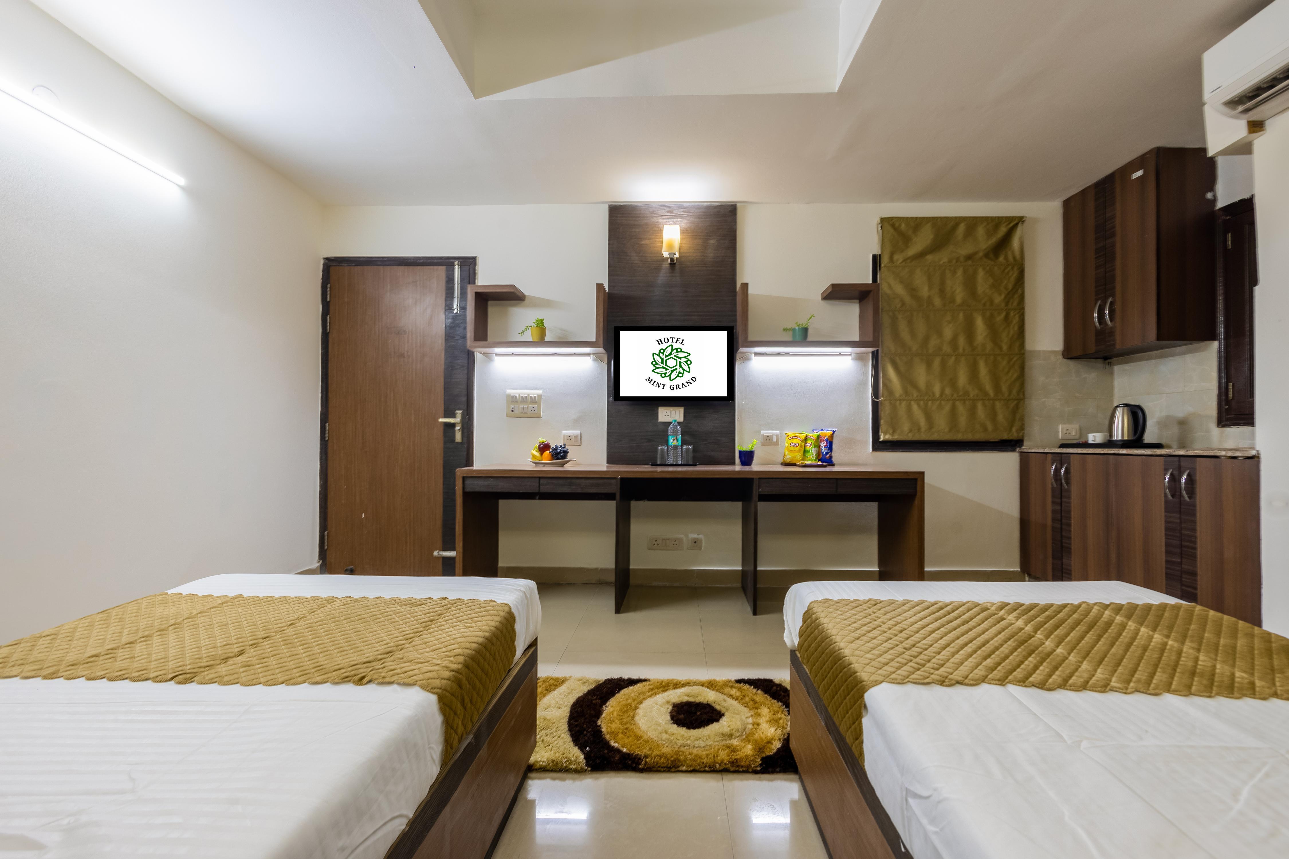 Hotel Mint Grand - A Smart Stay Near Yashobhoomi - Tap to explore photos