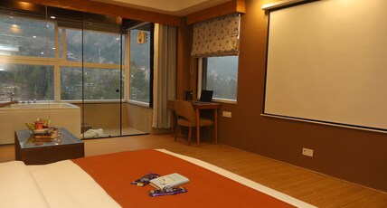 Udit Regency by west western kasol ( Central Heated and Air Cooled ) Room Type - Honeymoon suite with jacuzzi and Home Theater