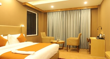 Udit Regency by west western kasol ( Central Heated and Air Cooled ) Room Type - Deluxe Room with Mountain View