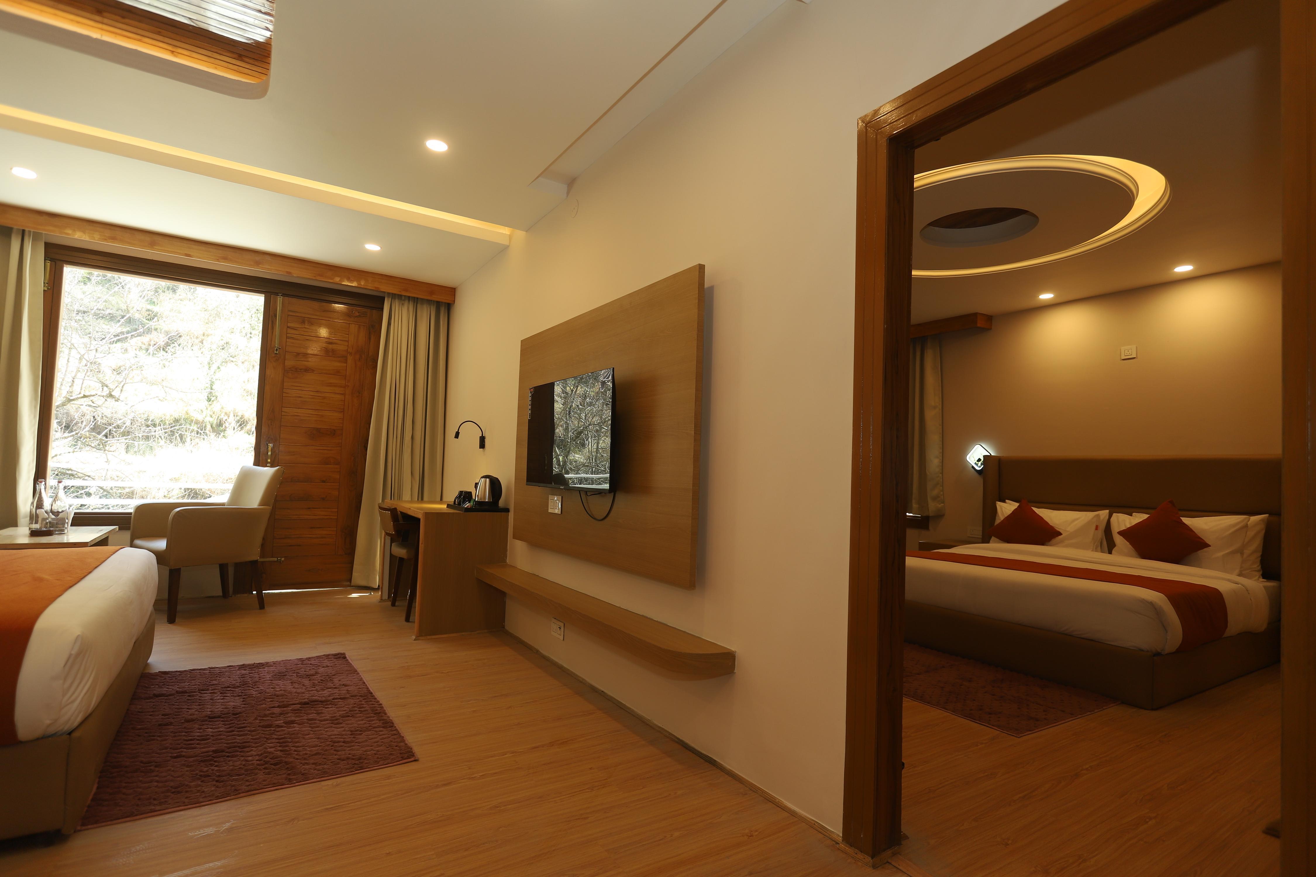Udit Regency by west western kasol ( Central Heated and Air Cooled ) Room Type - Family Room with Forest view