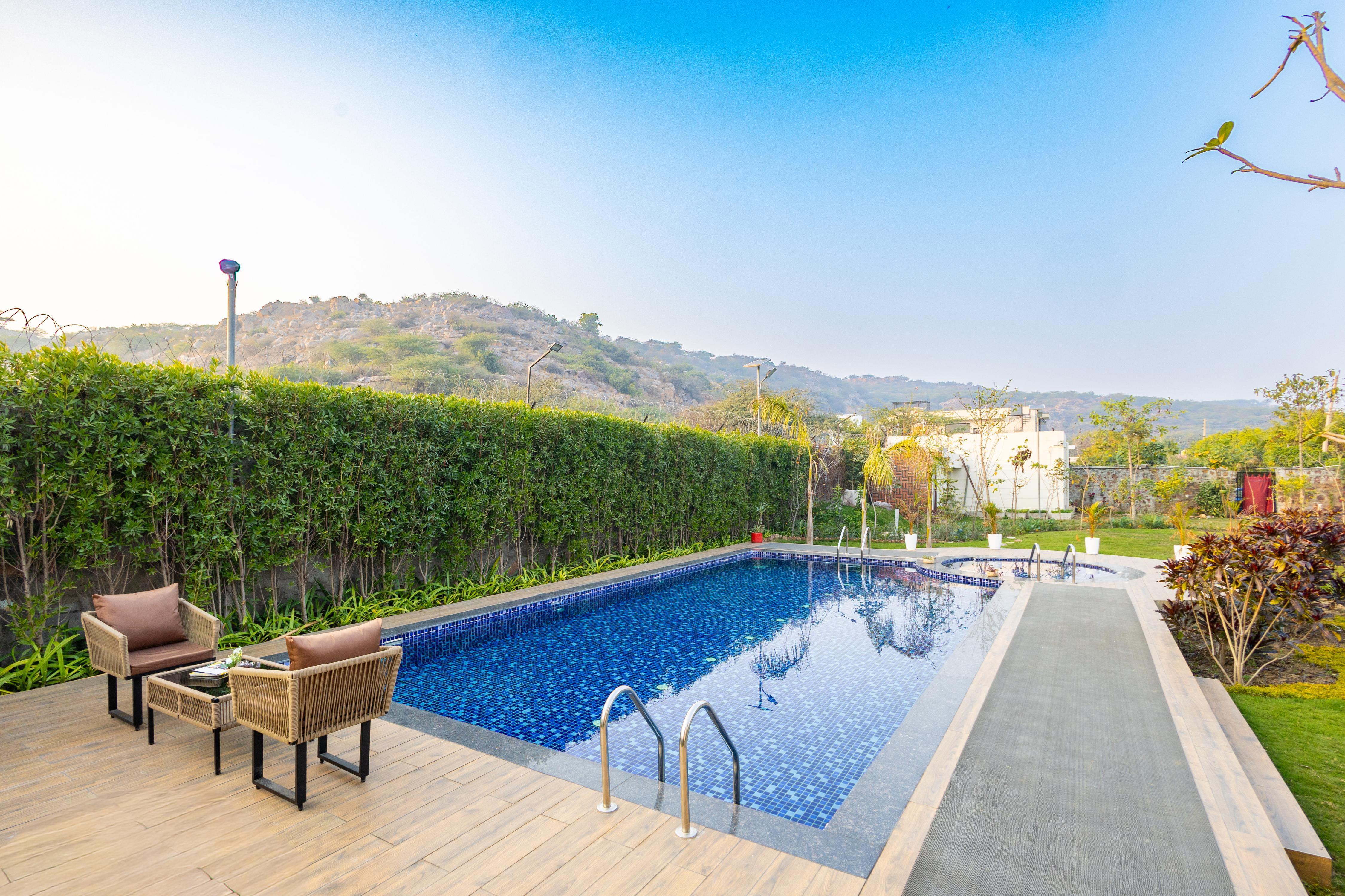 ELIVAAS Signature Prassanam Vatika 2 BHK Hillside Villa with Private Pool - Tap to explore photos