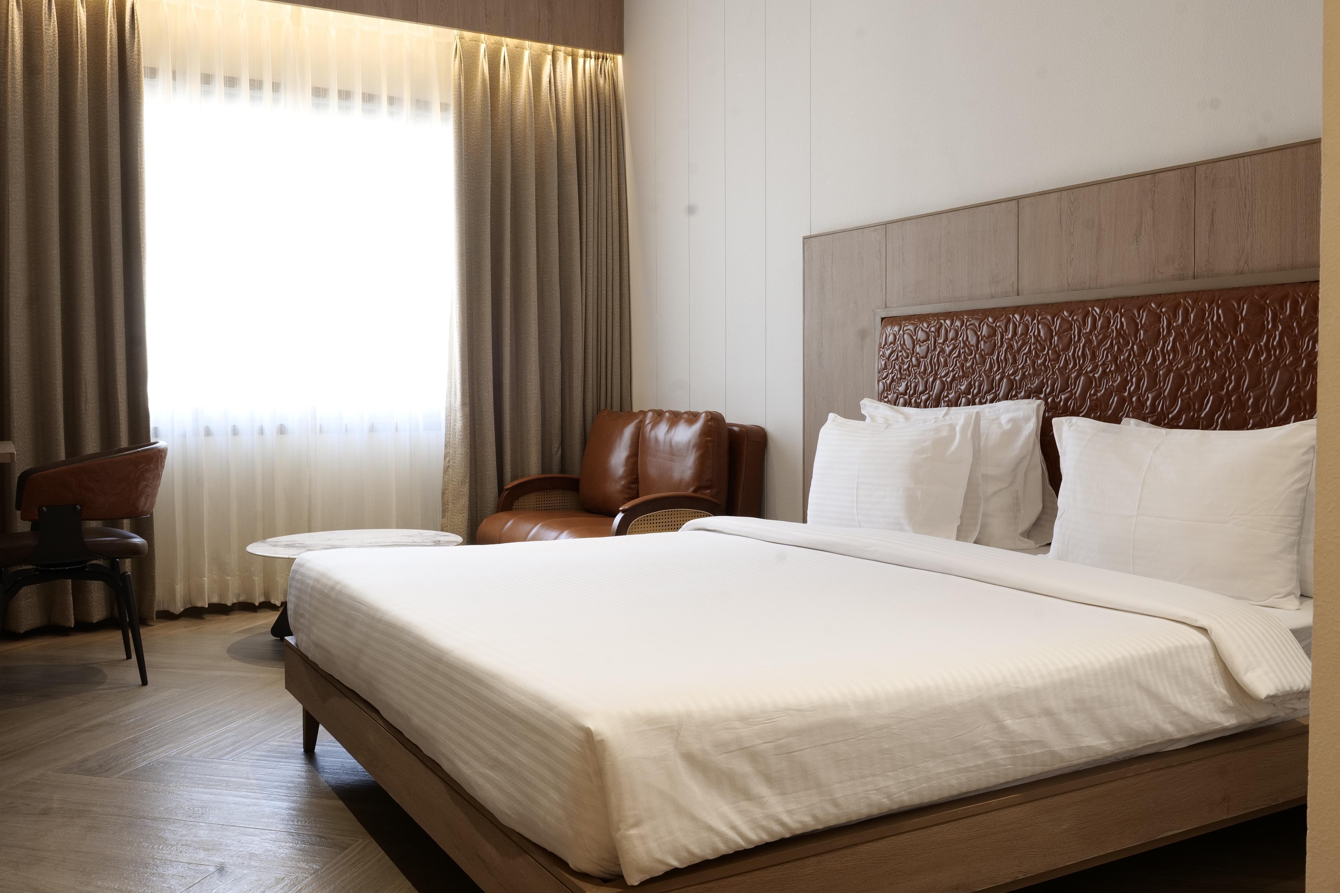 Get Inn Hotel - Tap to explore photos