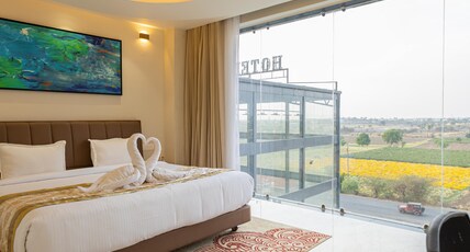 Saaz Hotel Club & Convention Centre Room Type - Junior Suite King Bed Pool View with Airport Transfer Saaz Hotel Club & Convention Centre Room Type - Junior Suite King Bed Pool View with Airport Transfer