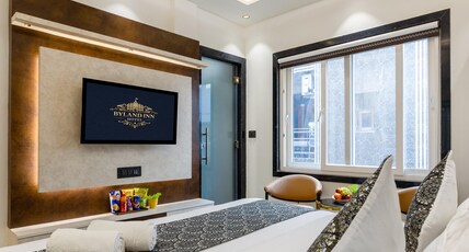 Hotel The Byland Inn Near Connaught Place Room Type - Luxury Room with City View Hotel The Byland Inn Near Connaught Place Room Type - Luxury Room with City View