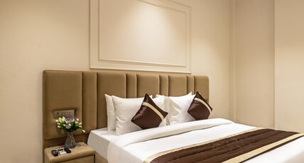 Hotel The Emporio Elite Near Shaheed Sthal Metro Station Room Type - Deluxe Room with Smart TV Hotel The Emporio Elite Near Shaheed Sthal Metro Station Room Type - Deluxe Room with Smart TV