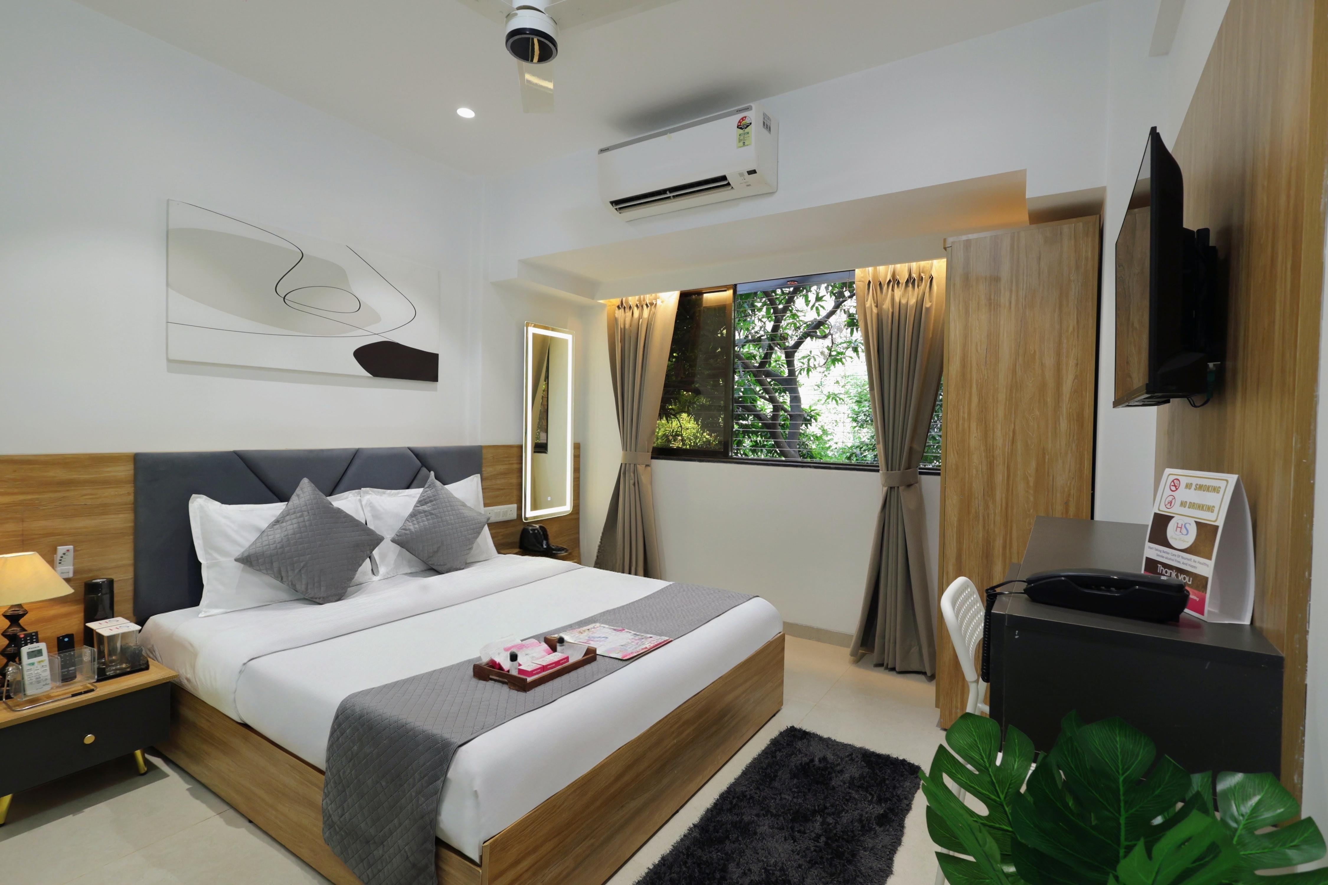 Chembur Homeotel - Gagal Home - Tap to explore photos