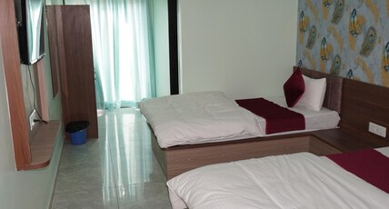 Hotel Neel Kamal. Room Type - Executive Triple Room(1 double 1 single bed) Hotel Neel Kamal. Room Type - Executive Triple Room(1 double 1 single bed)
