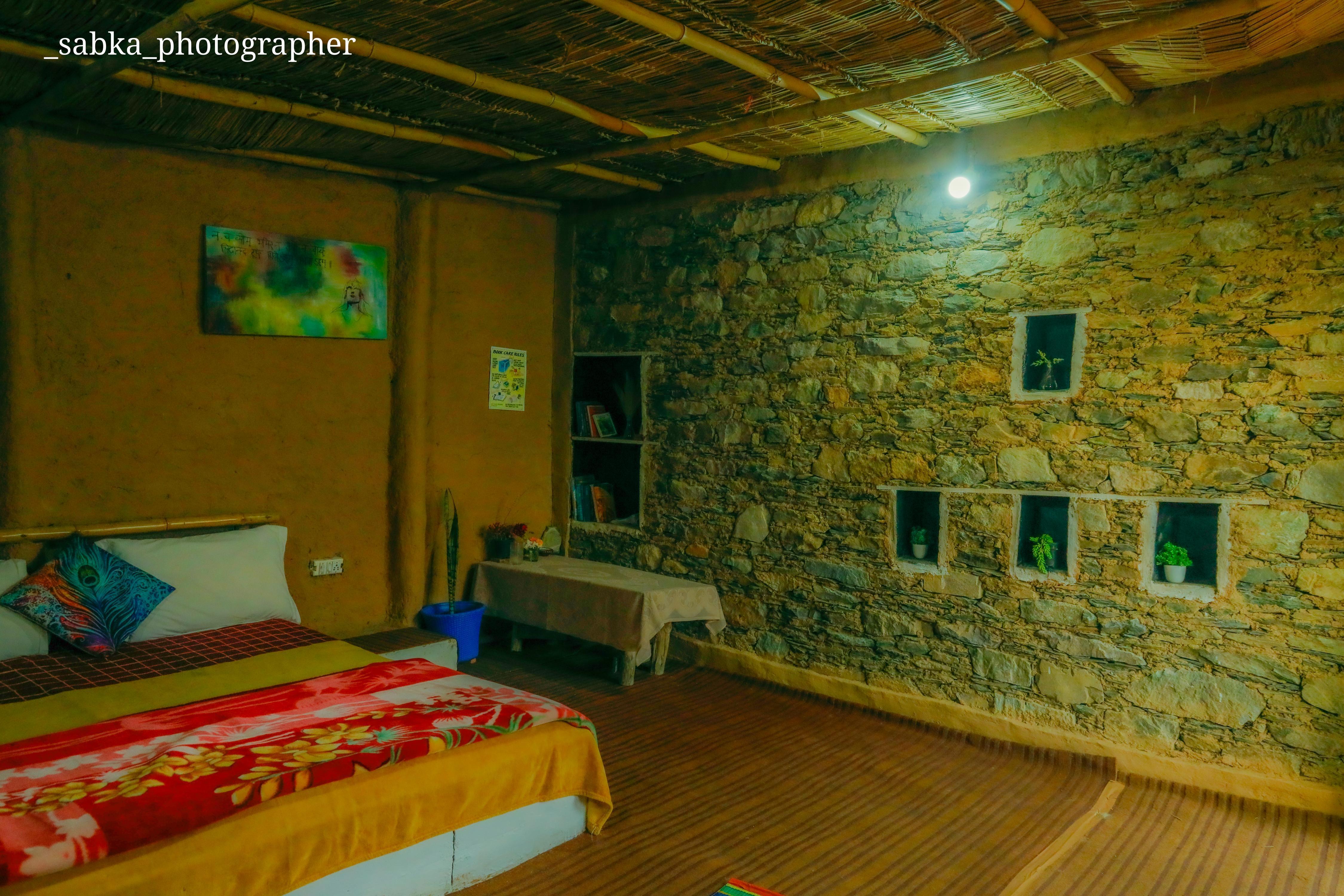 Stone Age Huts and Hostel Room Type - Mudhouse Room1