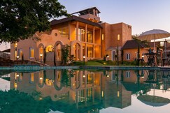 ELIVAAS Tuscan 5 BHK Villa with Private Pool and Garden