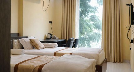 HOTEL MAHAL A UNIT OF AHIYAN RESTRO Room Type - Deluxe Room with Garden View HOTEL MAHAL A UNIT OF AHIYAN RESTRO Room Type - Deluxe Room with Garden View