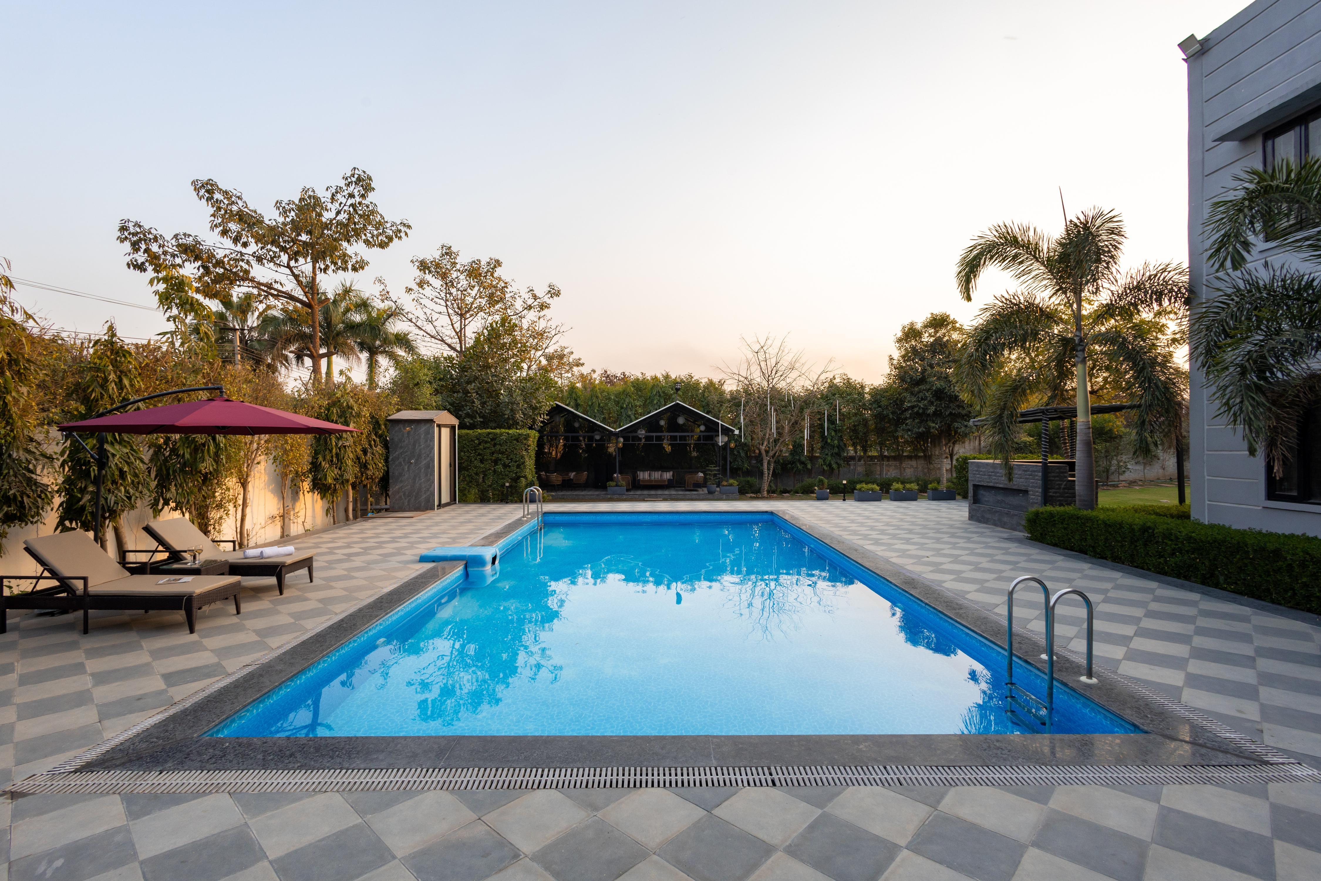 Alaya Stays KV Ventures Fable Cottage with Shared Pool - Tap to explore photos
