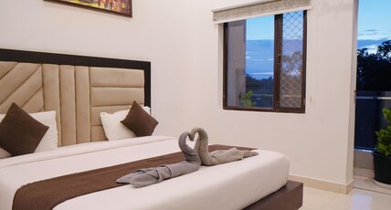 The Nines Hotel & Restaurants Room Type - Deluxe AC Room with Balcony The Nines Hotel & Restaurants Room Type - Deluxe AC Room with Balcony