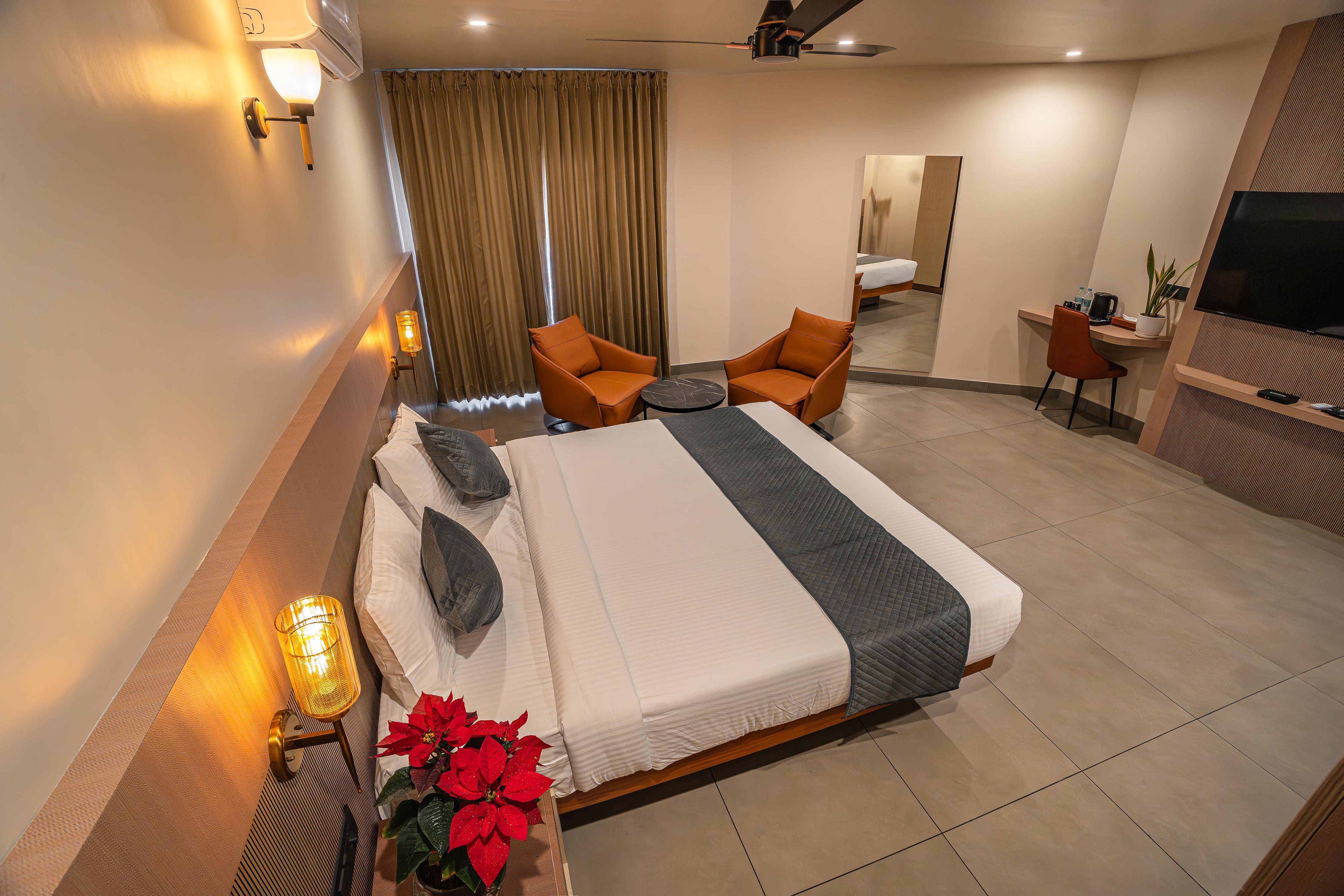 AURA INN & SUITES - Tap to explore photos