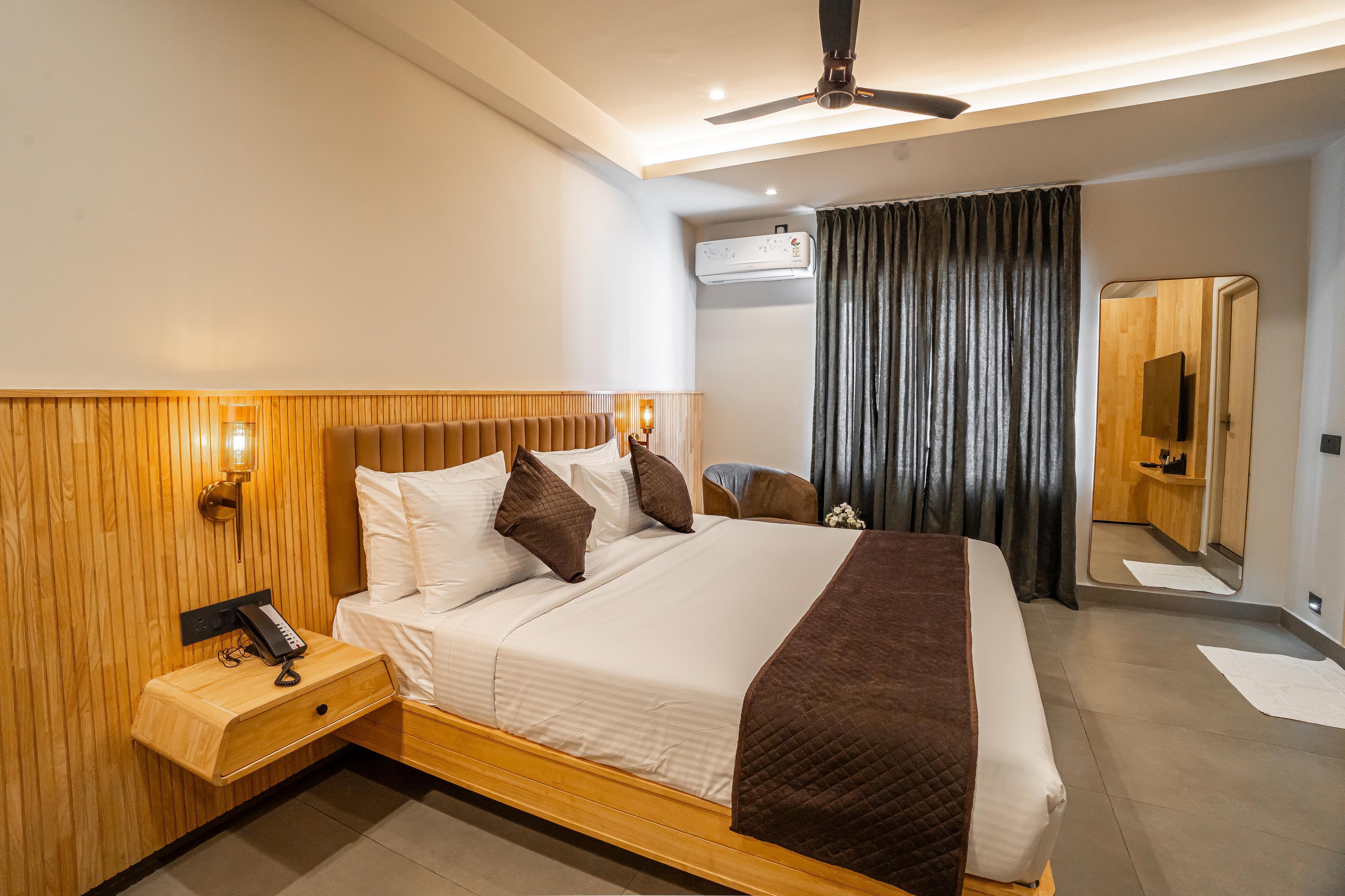 AURA INN & SUITES Room Type - Deluxe Room