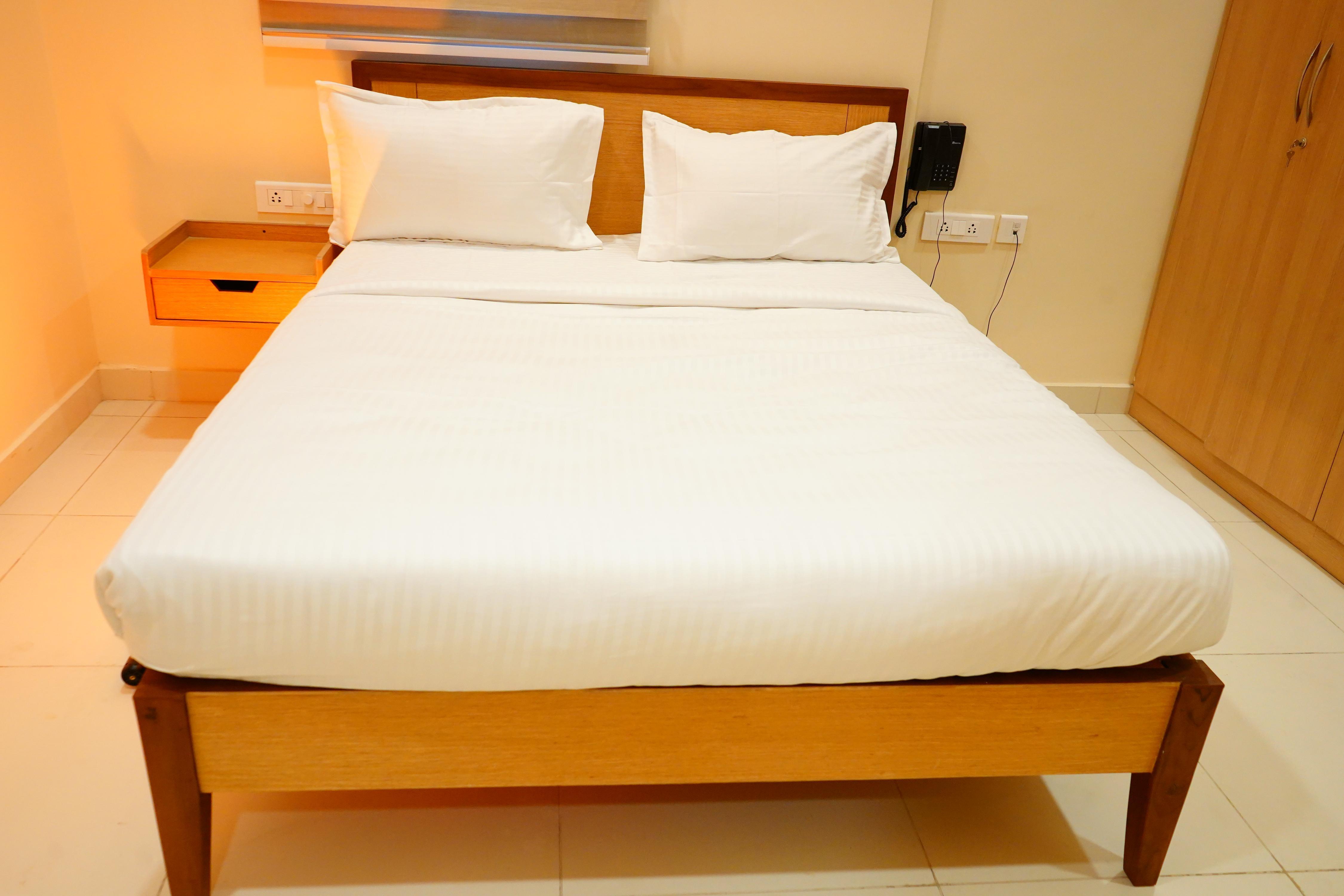 AM Suites Service Apartment - Tap to explore photos