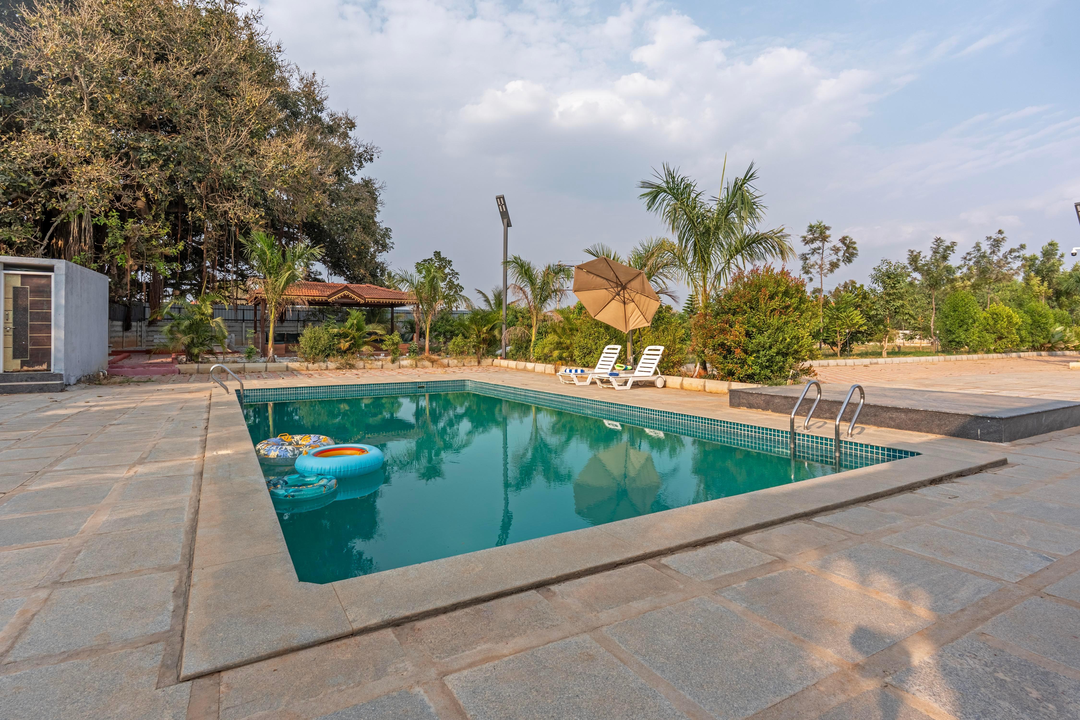 ELIVAAS Signature Courtyard Banyan | Rustic 2 BHK villa with pool - Tap to explore photos