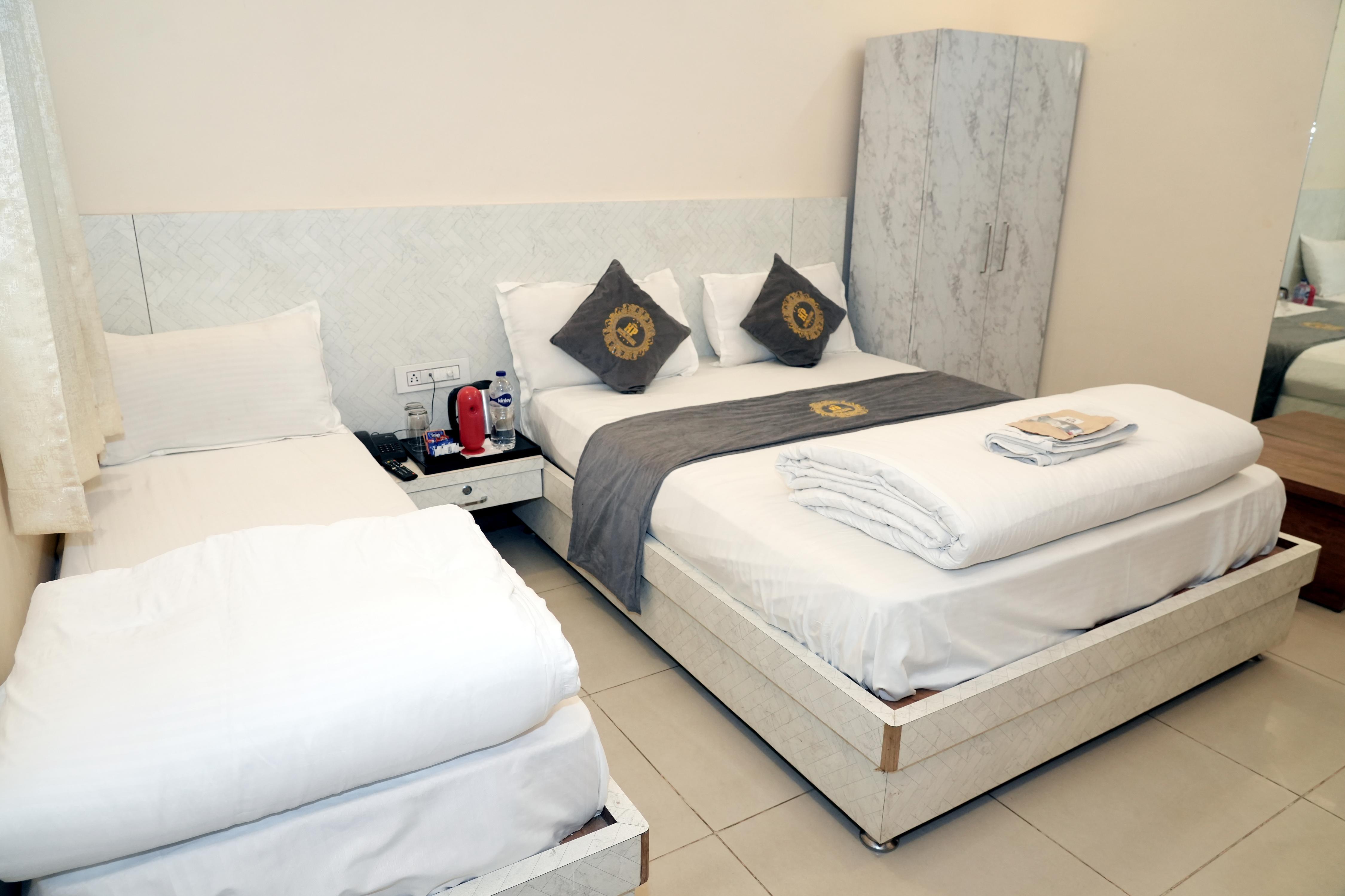 HOTEL PUJARI - Tap to explore photos