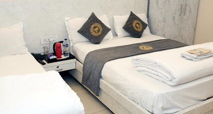 HOTEL PUJARI Room Type - LUXURY TRIPLE ROOM