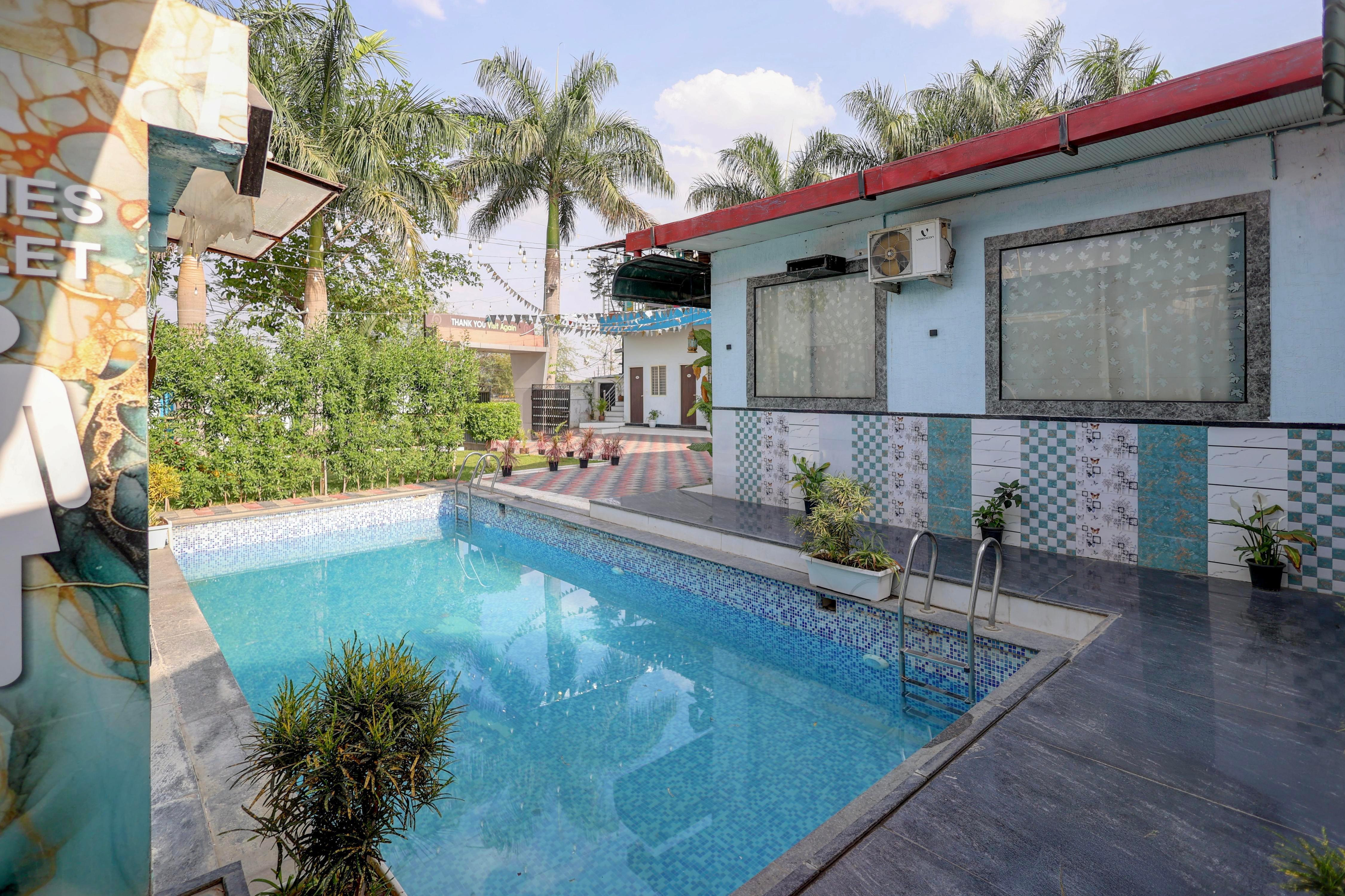 Hotel O P P Palm Retreat - Tap to explore photos