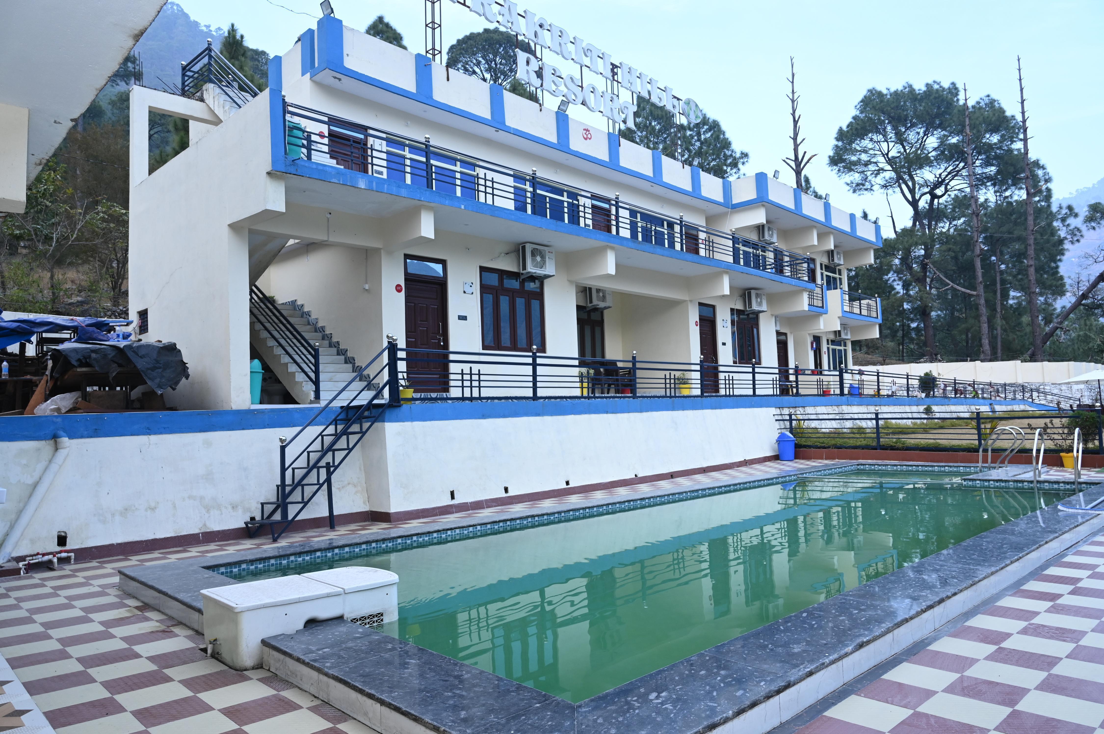 Prakriti Hill Resorts Room Type - Deluxe Room with Balcony and Mountain View