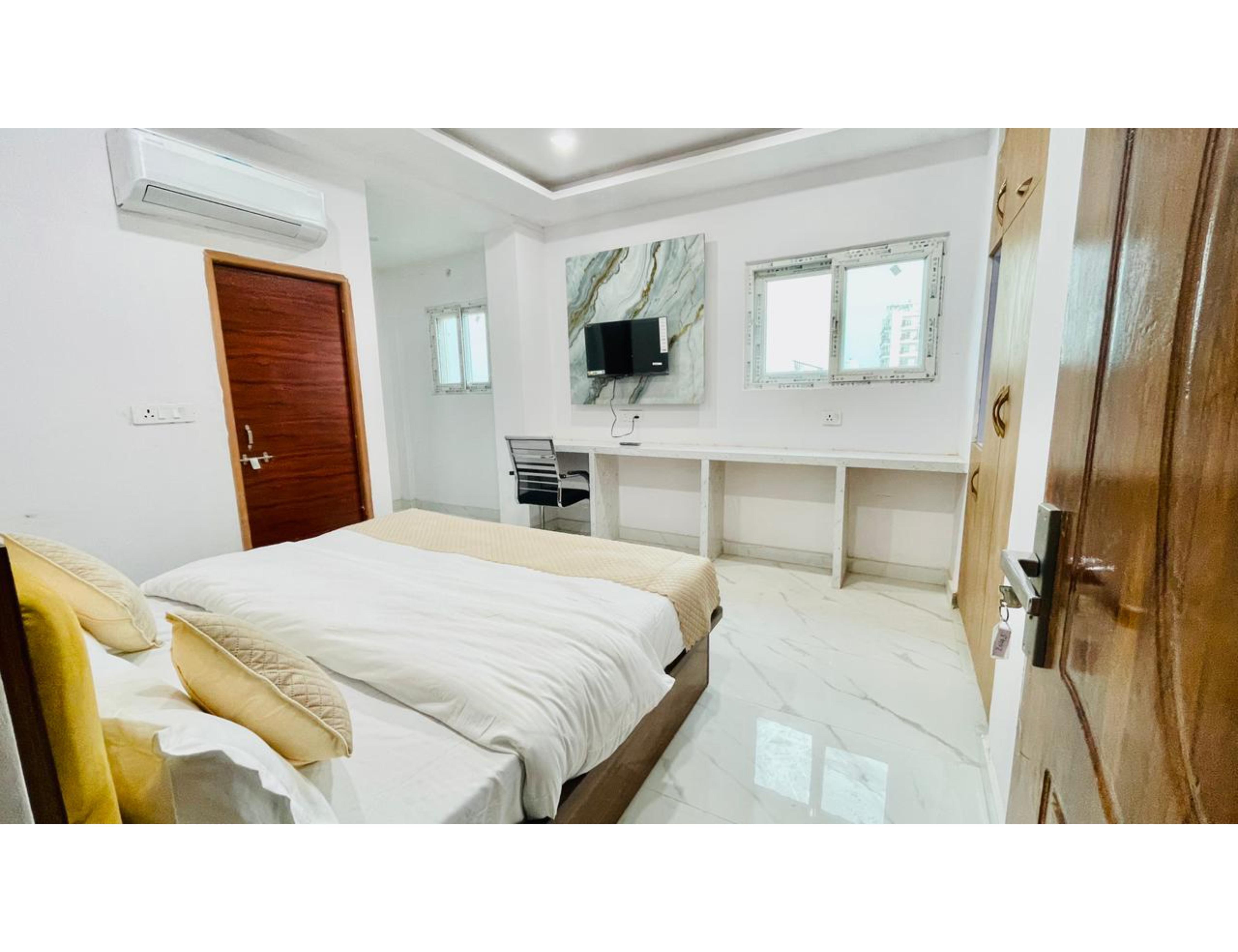 Sai Sansthan Inn Room Type - Deluxe Room