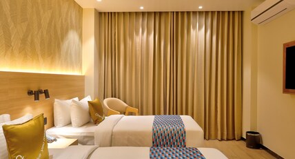 Palette Millennium City Hotel & Convention Centre by CheckIn, Gurugram Room Type - Premium Twin Room with Balcony