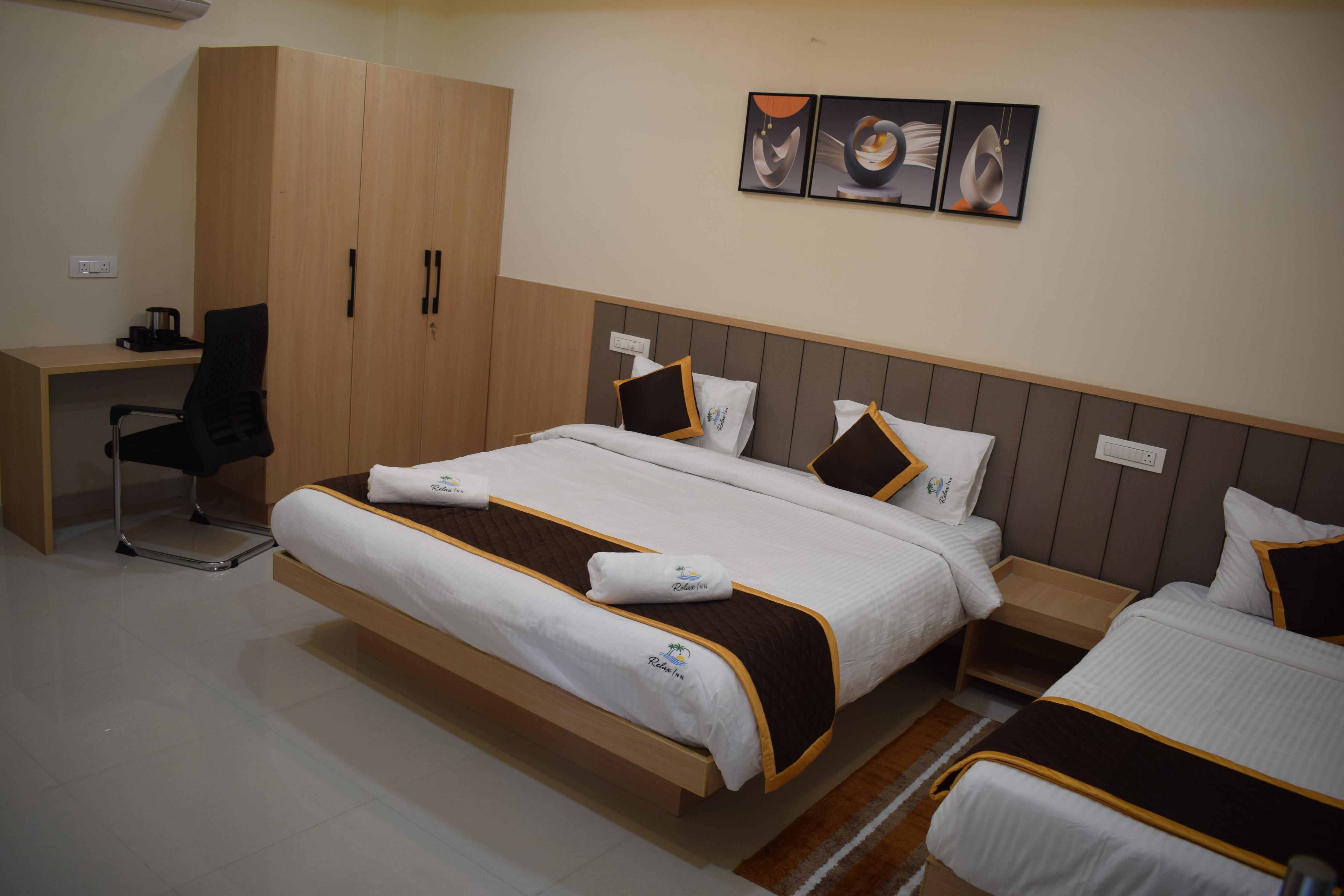 Relax Inn Suites & Rooms - Tap to explore photos