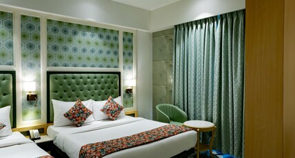 Sio Suites Room Type - Premium Triple Room