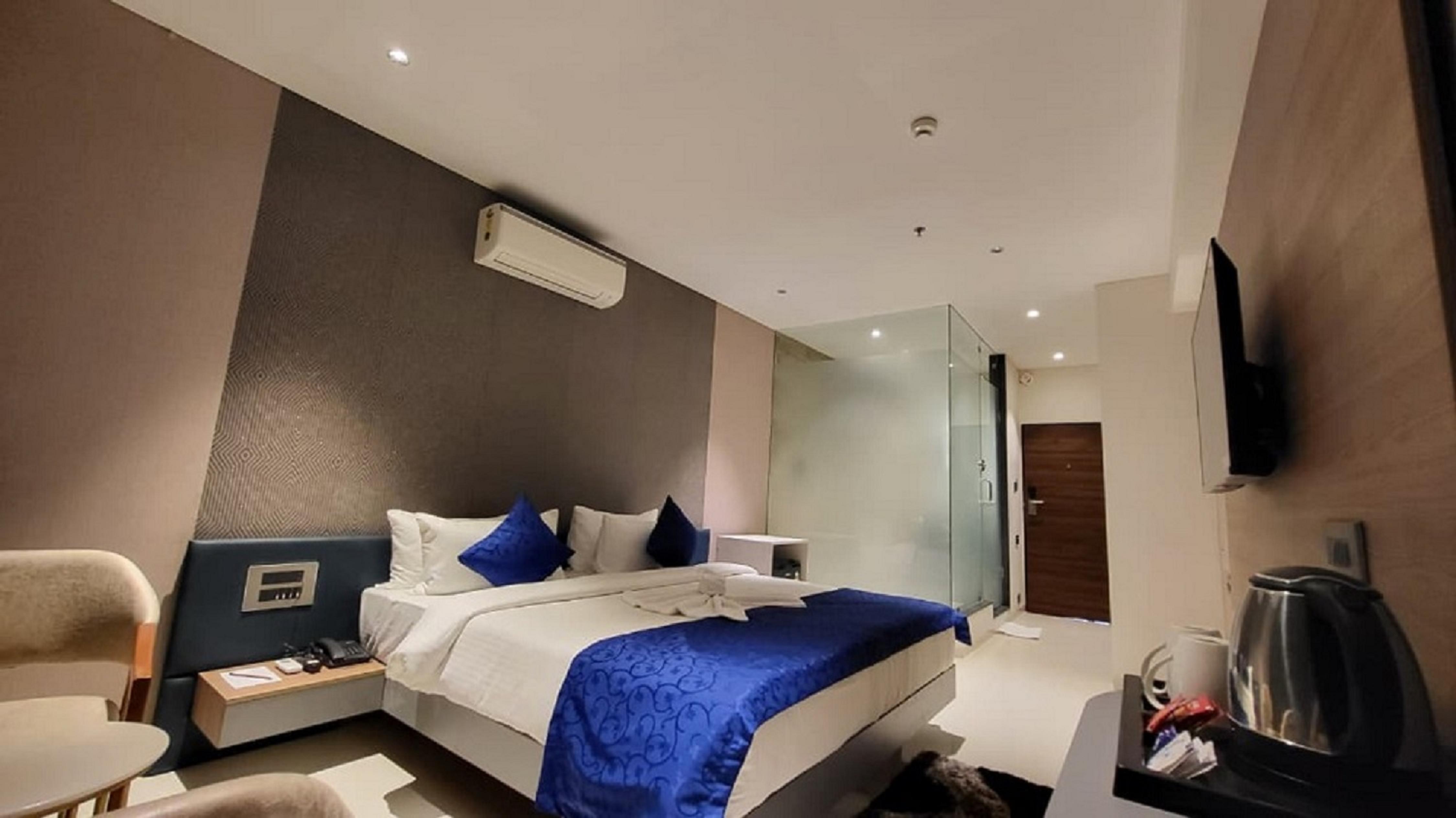 The Blues Hotel Golden Glory Rajkot - Tap to explore photos