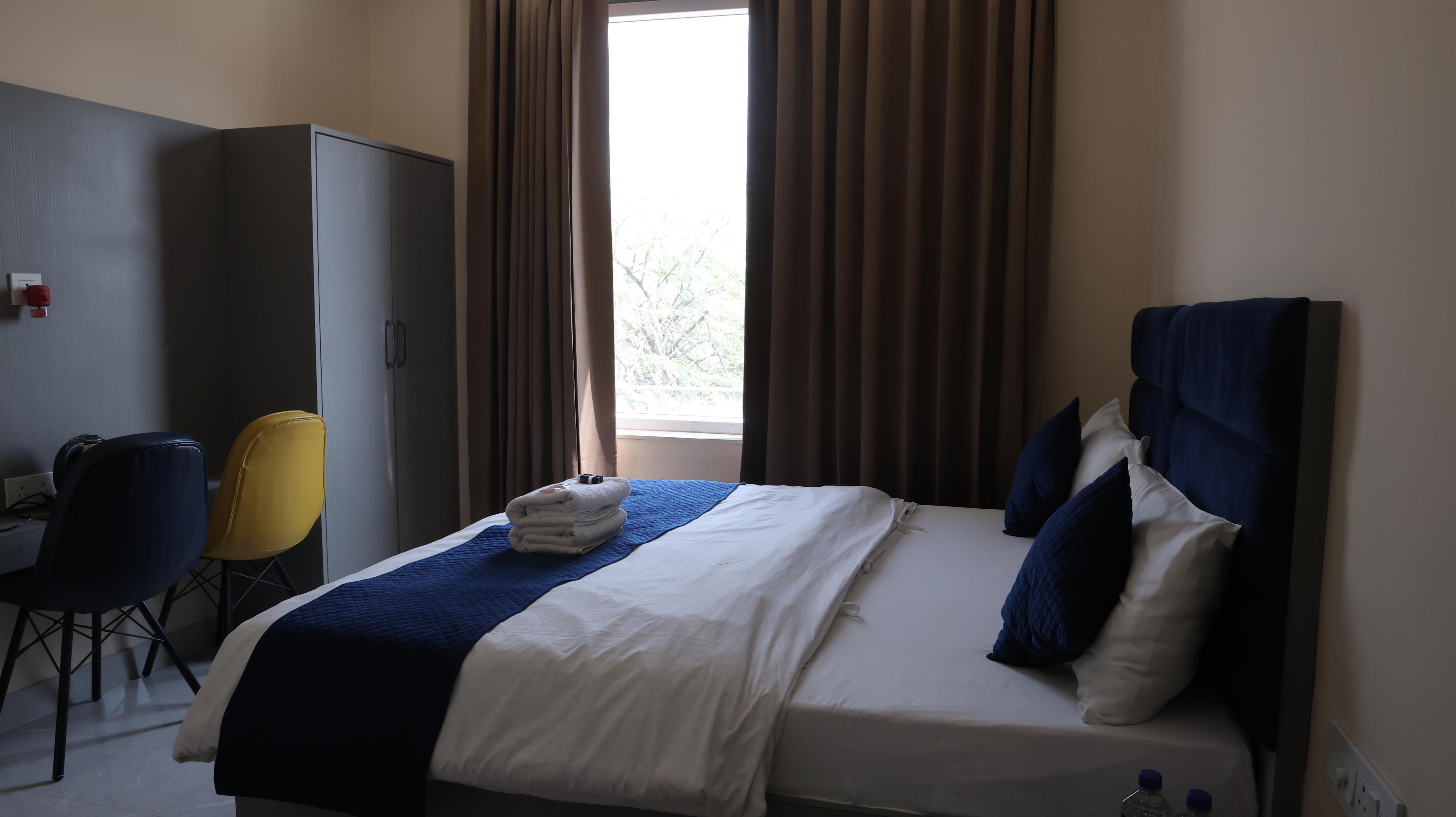 Rosewood Residency Room Type - Deluxe City View Room with King Bed