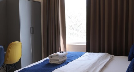 Rosewood Residency Room Type - Deluxe City View Room with King Bed Rosewood Residency Room Type - Deluxe City View Room with King Bed