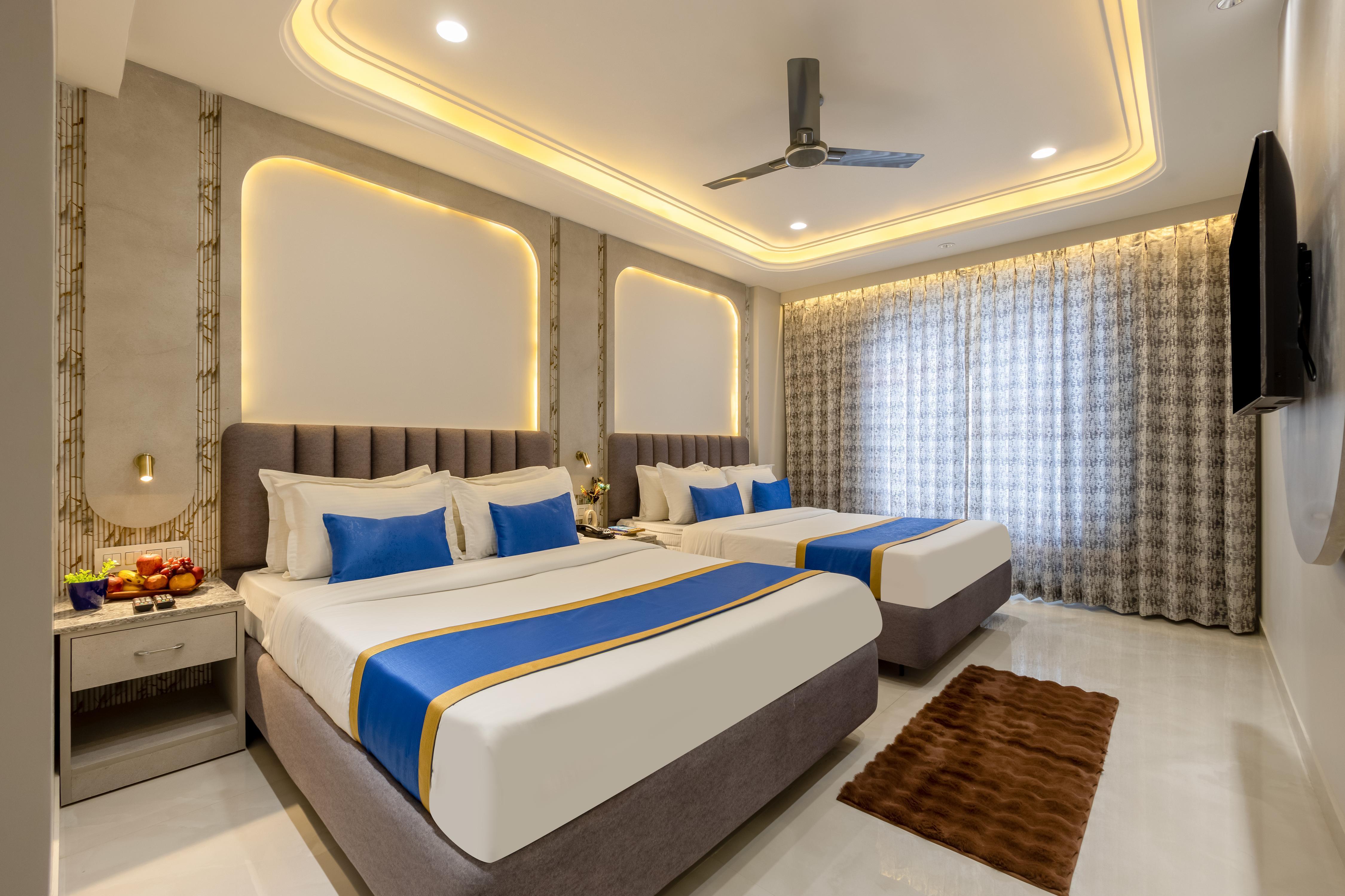 Anu Plaza Luxury Living | Quiet Soundproof Rooms Near Connaught Place & New Delhi Railway Station - Tap to explore photos