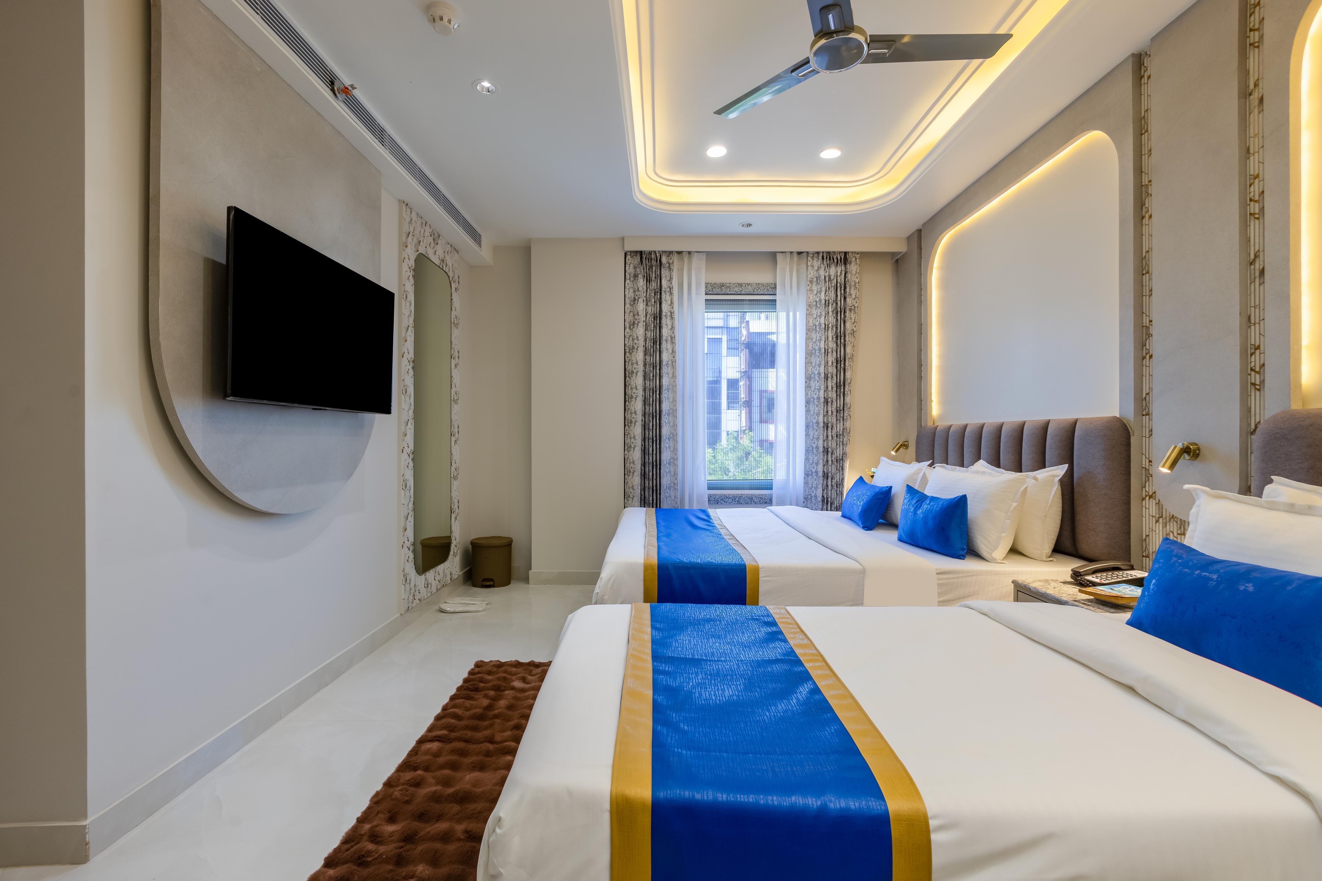 Anu Plaza Luxury Living | Quiet Soundproof Rooms Near Connaught Place & New Delhi Railway Station - Tap to explore photos