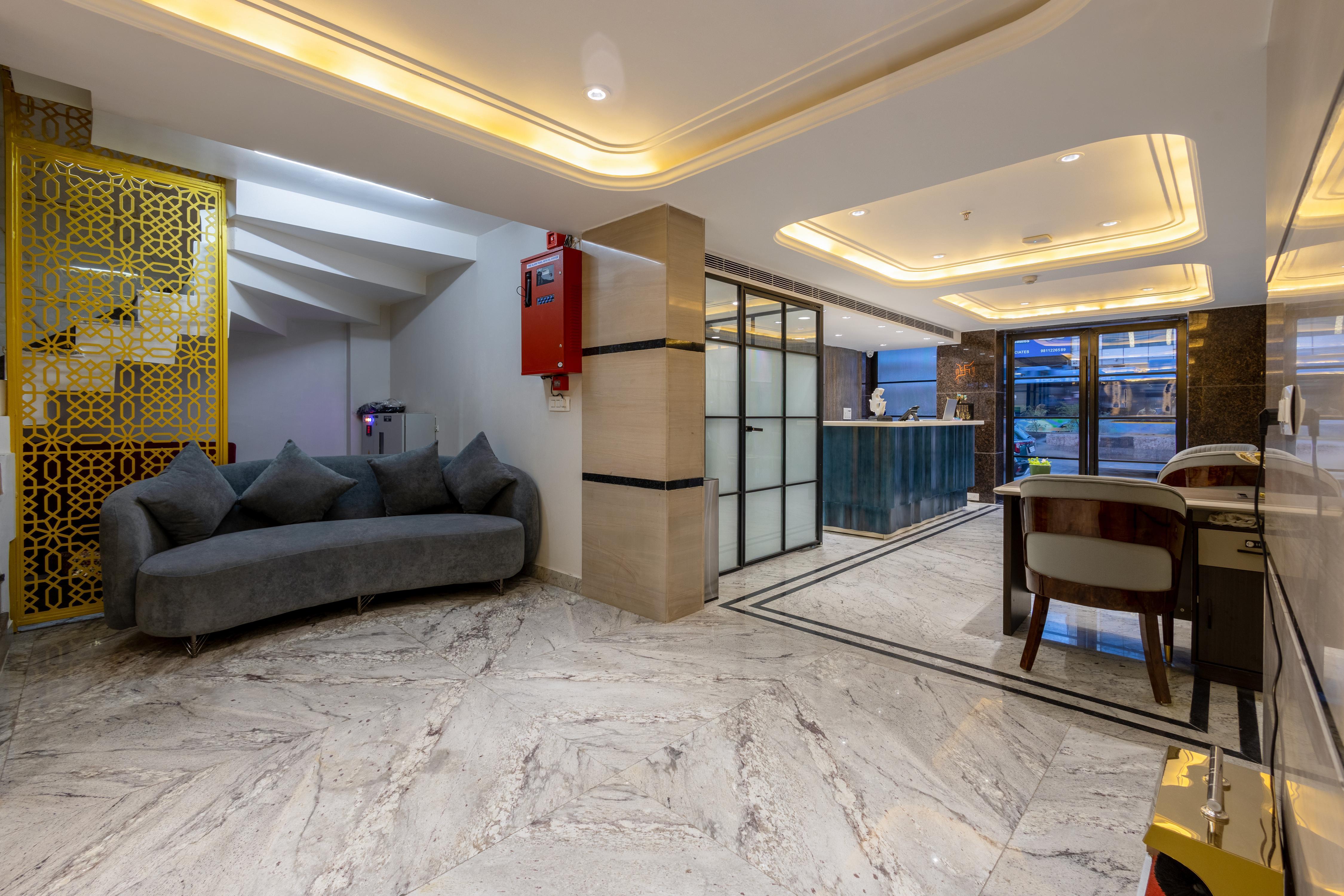 Anu Plaza Luxury Living | Quiet Soundproof Rooms Near Connaught Place & New Delhi Railway Station - Tap to explore photos