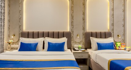 Anu Plaza Luxury Living | Quiet Soundproof Rooms Near Connaught Place & New Delhi Railway Station Room Type - Luxury Family Suite - King Bed (2Adults) + 1 Bed (1 Adult) Anu Plaza Luxury Living | Quiet Soundproof Rooms Near Connaught Place & New Delhi Railway Station Room Type - Luxury Family Suite - King Bed (2Adults) + 1 Bed (1 Adult)