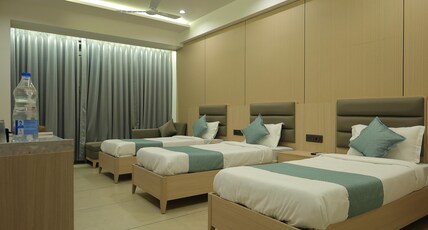 Sarju Palace Room Type - Deluxe Triple Bed Room.