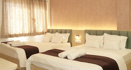 SAMYAK STAY Room Type - Family Room with Two double bed and balcony
