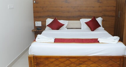 LAKSHMI BALAJI RESIDENCY Room Type - Double Room with Mountain View - NON AC LAKSHMI BALAJI RESIDENCY Room Type - Double Room with Mountain View - NON AC