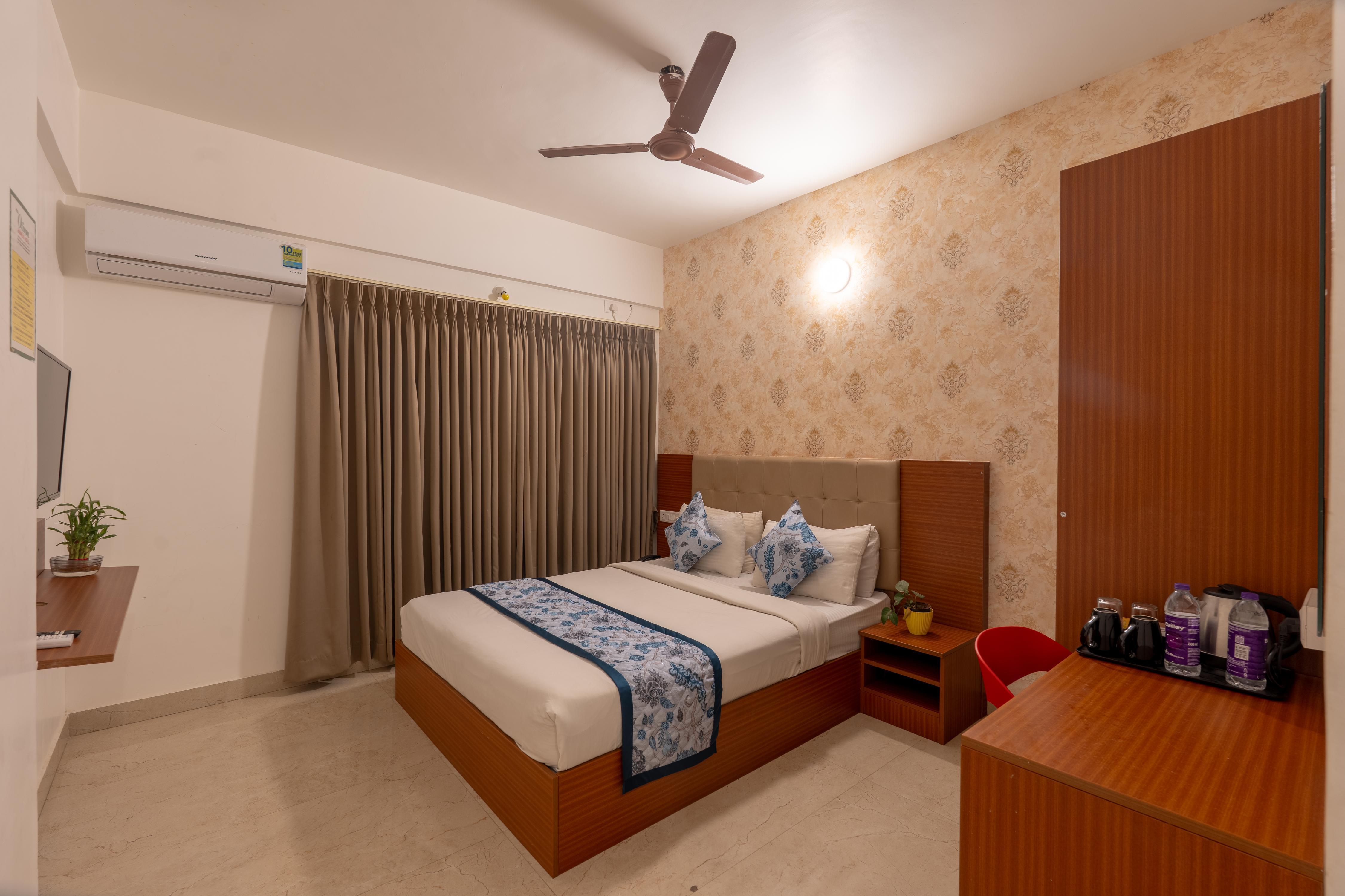PETALS OTIUM HOTEL Room Type - Deluxe Room