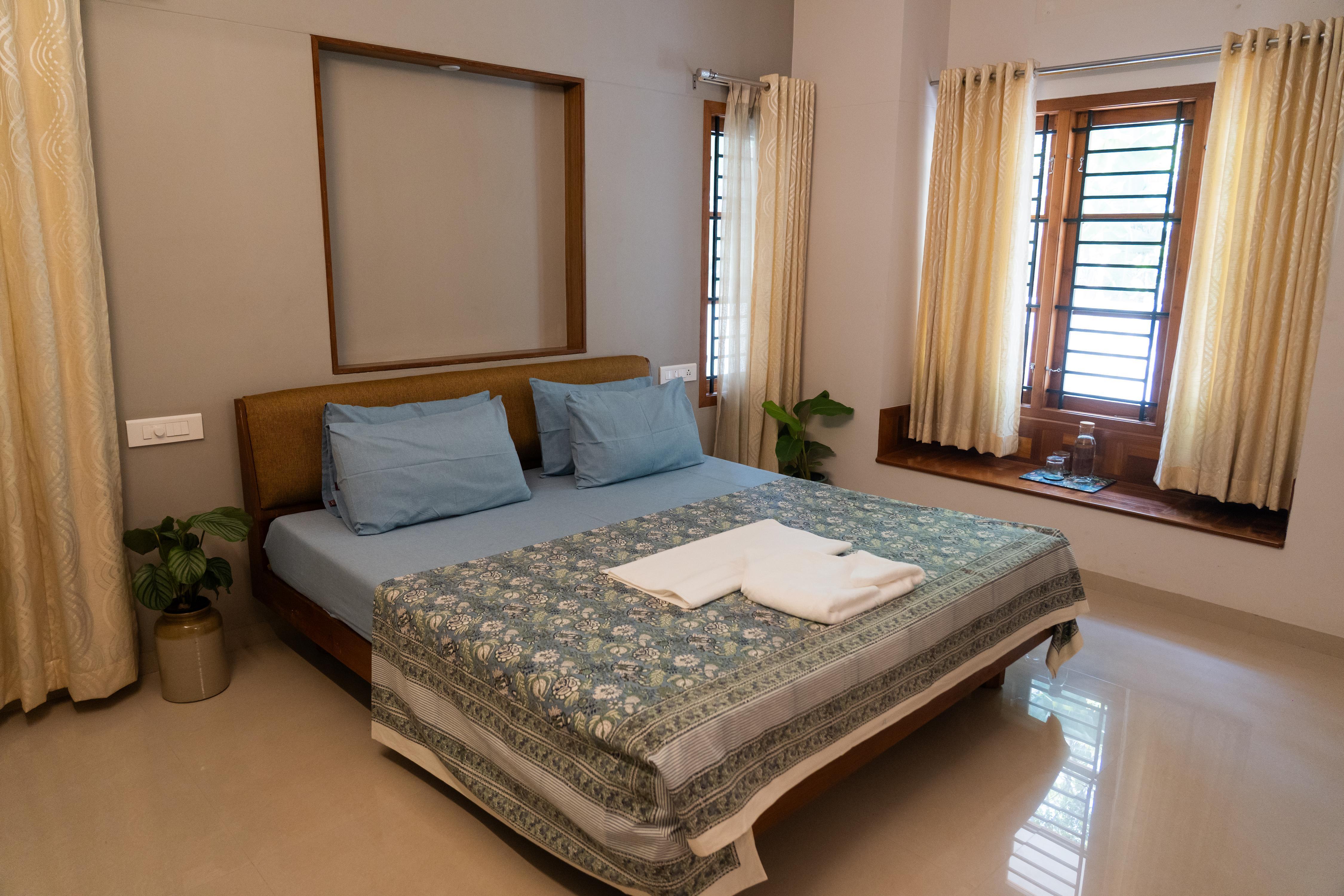 PlanNothing Surf & Stay Room Type - Deluxe King Room Non AC