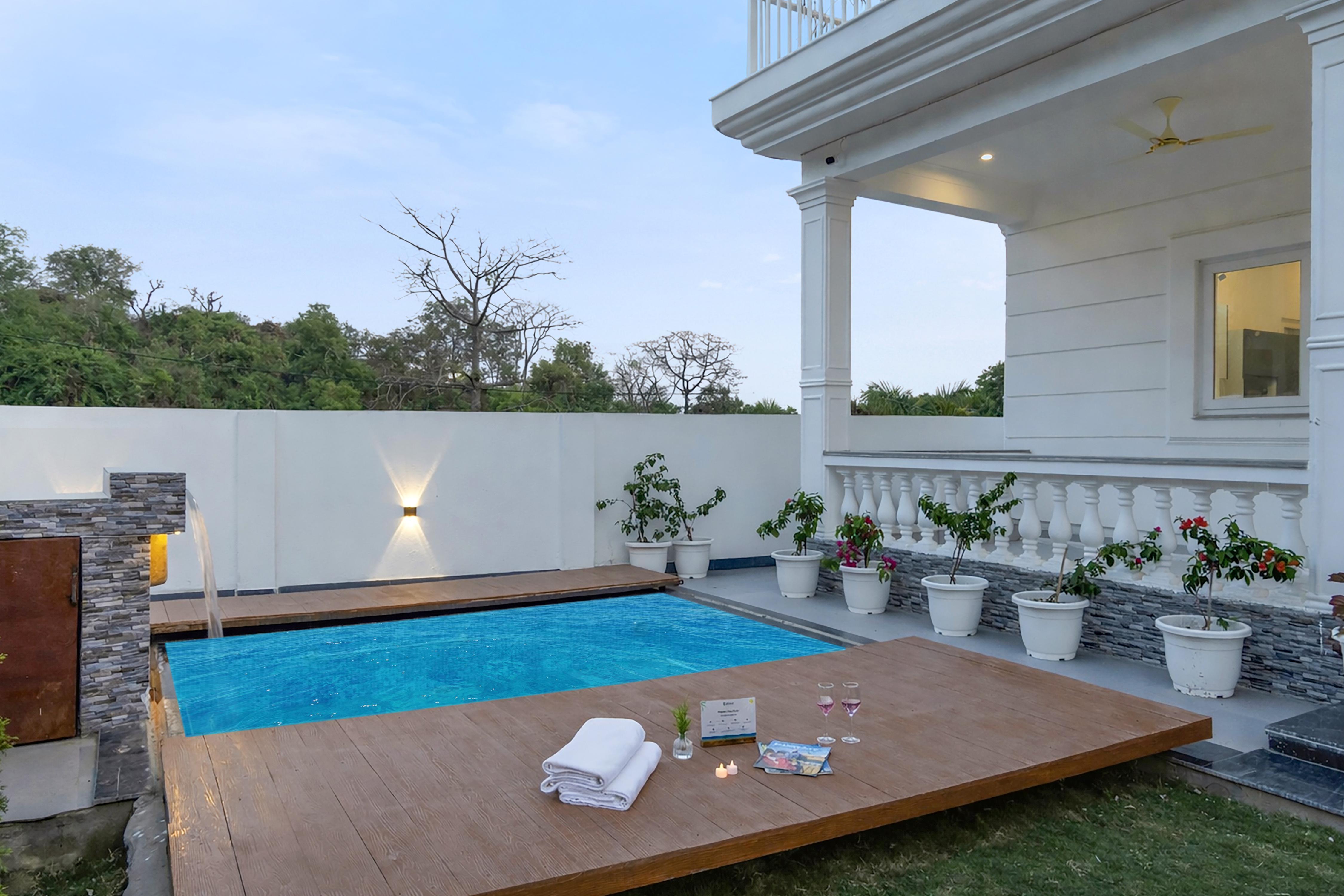 ELIVAAS Signature Kimadi House 4 BHK English Style Villa with Pool - Tap to explore photos