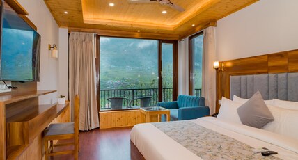 SNOW CITY STAYS-SHIVALAYA - HEATED & AIR COOLED STAY Room Type - Premium Room with Balcony (River & Forest View) SNOW CITY STAYS-SHIVALAYA - HEATED & AIR COOLED STAY Room Type - Premium Room with Balcony (River & Forest View)