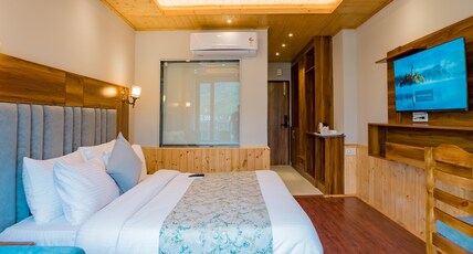 SNOW CITY STAYS-SHIVALAYA - HEATED & AIR COOLED STAY Room Type - Deluxe Room without Balcony (Forest View) SNOW CITY STAYS-SHIVALAYA - HEATED & AIR COOLED STAY Room Type - Deluxe Room without Balcony (Forest View)