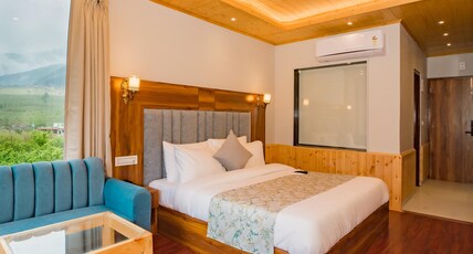 SNOW CITY STAYS-SHIVALAYA - HEATED & AIR COOLED STAY Room Type - Deluxe Room with Balcony