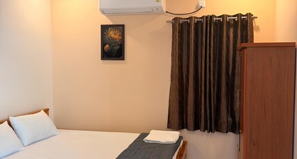 Sri Aavasa Homestays Room Type - Deluex queen room
