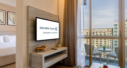 Golden Tulip Gurugram Room Type - Luxury Suite - 1 Double Bed Golden Tulip Gurugram Room Type - Luxury Suite - 1 Double Bed