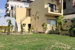 Photos of The Palm House | Rooms|Pool|Garden & Parking