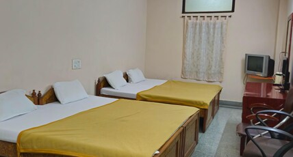 Harsha lodge Room Type - Four Bed Deluxe AC Room