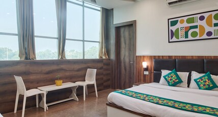 Treebo Chanakya Palm Room Type - Premium Room